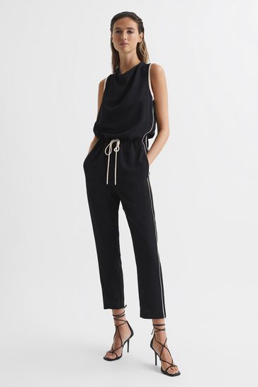 Black jumpsuit with white stripe on side cheap