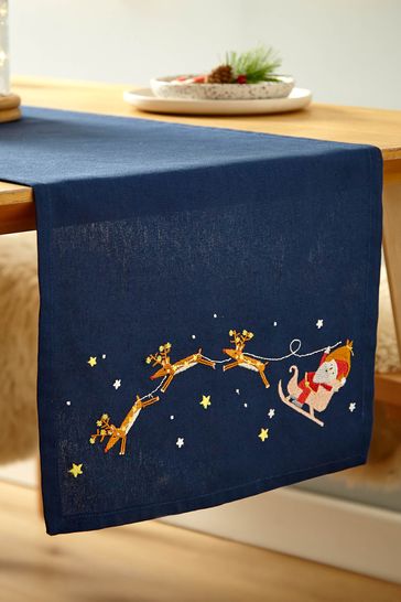 Catherine Lansfield Blue Santa's Christmas Wonderland Wipeable Table Runner