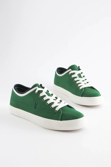 Green top canvas trainers