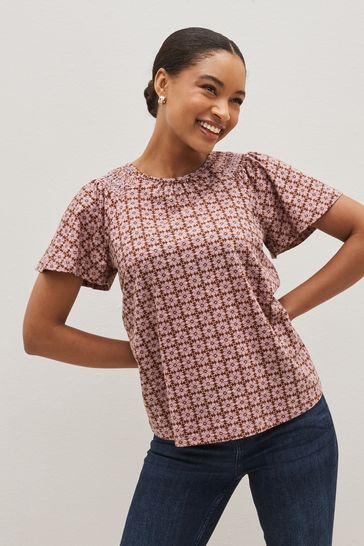 Buy Purple Tile Smocked Short Sleeves Round Neck Top from Next Poland
