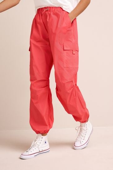 Bright pink cargo trousers shop