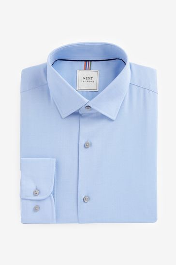 Blue shirt white collar next 2025