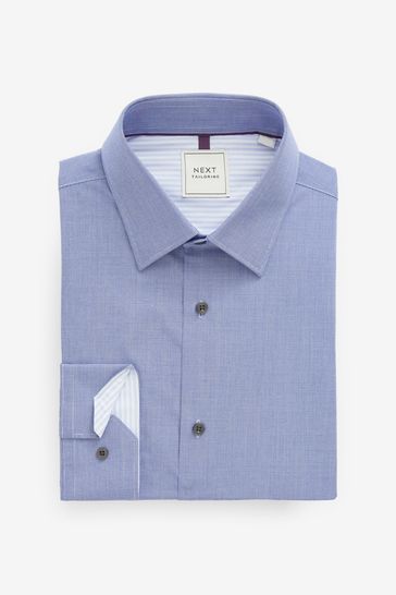 Blue shirt white collar next 2025