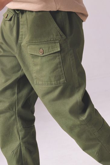 Green cargo trousers top