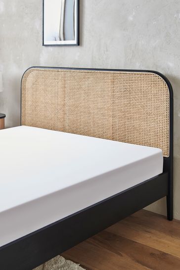 Black and rattan bed on sale frame