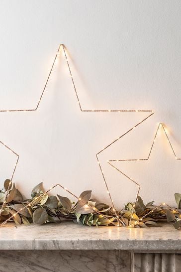 Next light up hot sale star