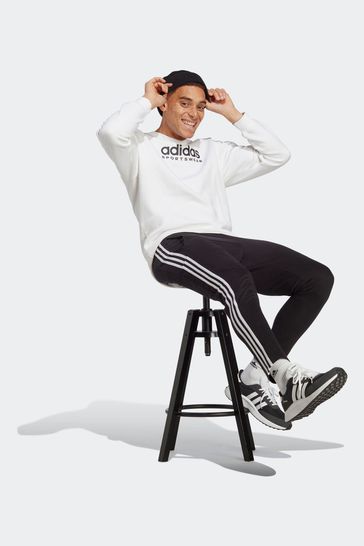 Adidas originals jersey joggers best sale in black