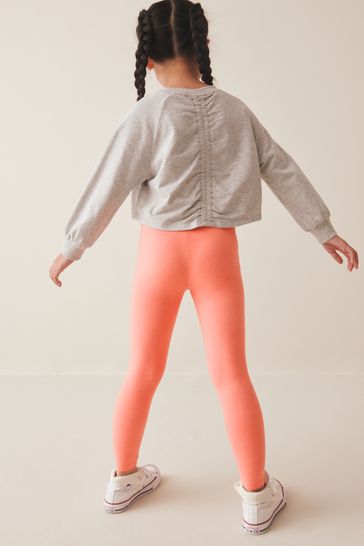 Orange leggings top