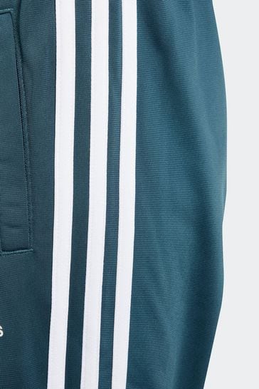 Blue and green adidas track top pants