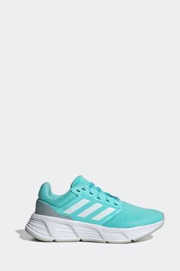 Mint green top adidas tennis shoes