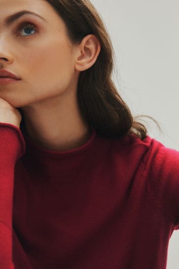 Merino wool roll neck jumper hot sale