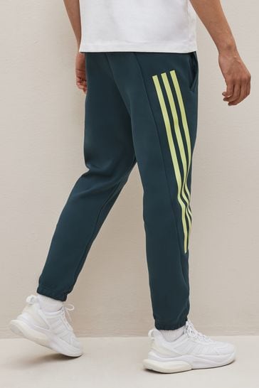 Buy adidas Green Sportswear Future Icons 3 Stripes Joggers from