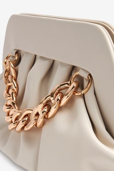 Next cream clutch bag deals