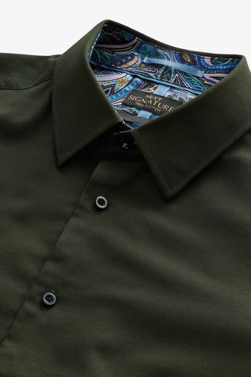 Ucb olive green shirt sales