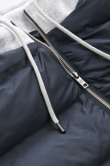 Blue top grey jacket