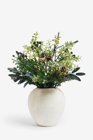 Green artificial flowers in vase hotsell