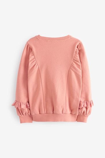 Coral pink sweatshirt top