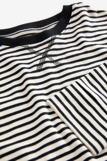 Black t shirt outlet over white long sleeve