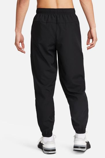 Nike black windbreaker pants 2025