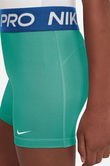 Blue and green nike shorts hotsell