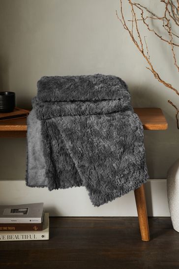 Buy Grey Mila Cosy Textured Faux Fur Throw from Next Luxembourg