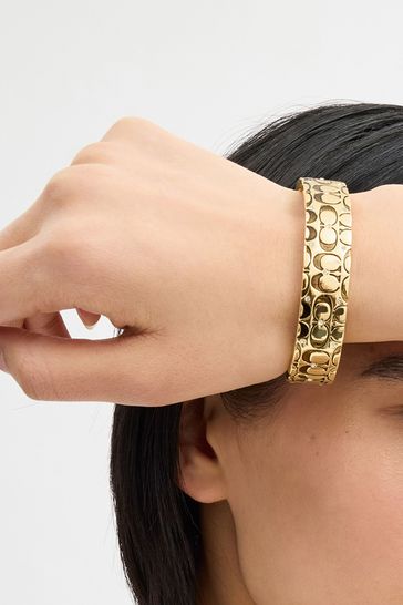 COACH Silver Tone Quilted C Hinged Bangle Bracelet