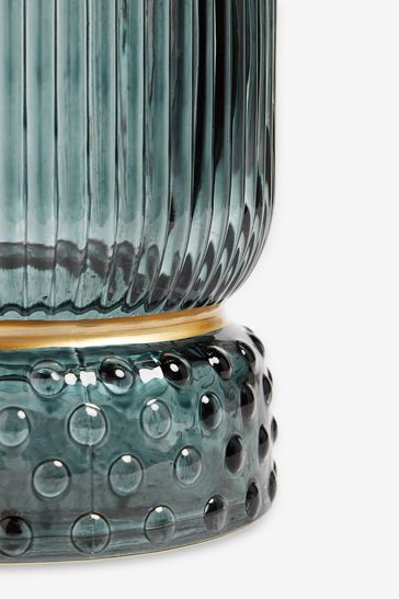 Blue glass hurricane candle holder top