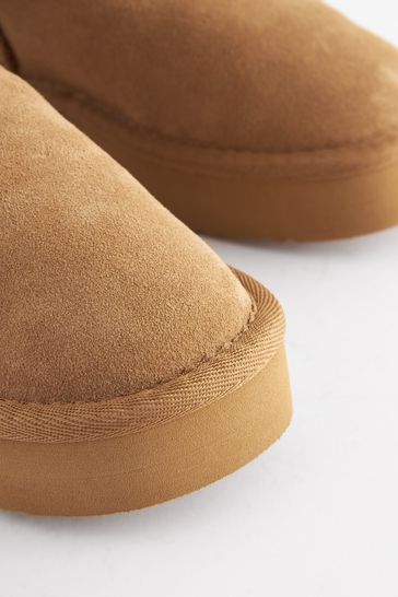 Tan slip hotsell on boots