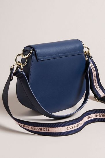 Navy blue store handbags next