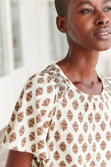 Smocked short shop sleeve top
