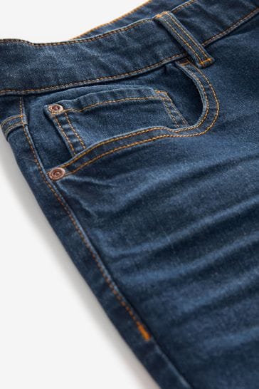Buy Mid Blue Straight Essential Stretch Jeans from Next Luxembourg