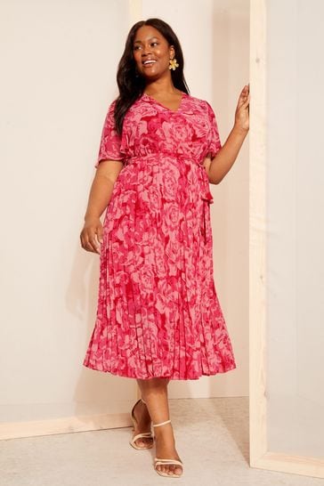 Buy Curves Like These Pink Pleated Chiffon Flutter Sleeve Wrap Midi Dress from Next Turkey