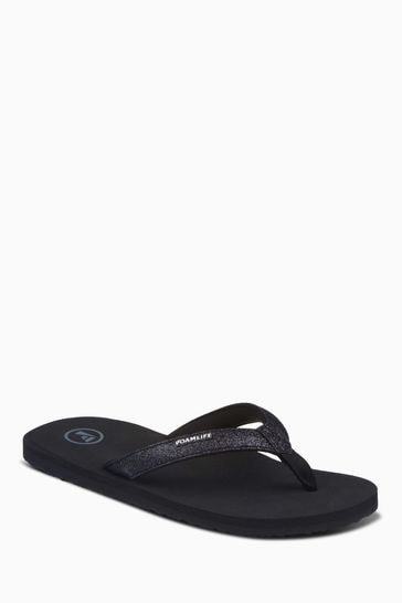 Black foam flip flops on sale