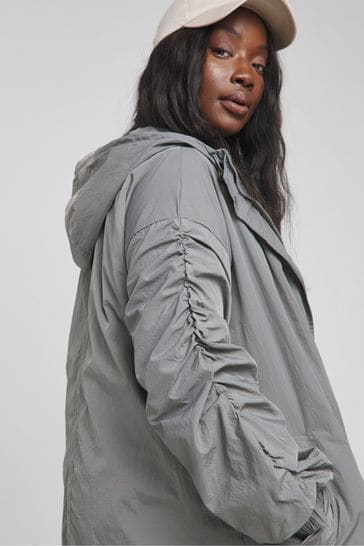 Buy Simply Be Grey Dipped Hem Rain Mac Coat from Next Denmark