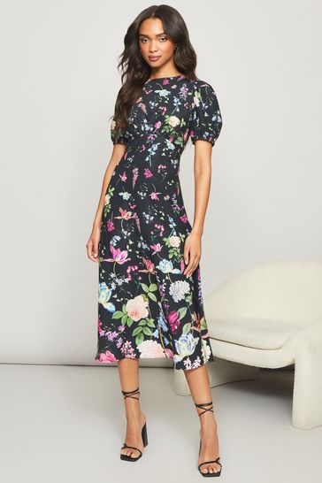 Buy Lipsy Black Base Floral Print Woven Underbust Puff Sleeve Summer Midi Dress from Next Luxembourg