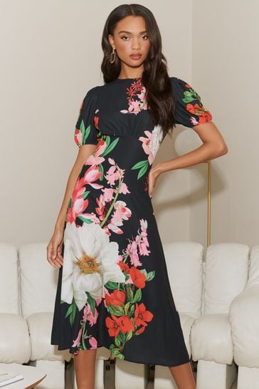 Buy Lipsy Black Floral Petite Woven Underbust Puff Sleeve Summer Midi Dress  from Next Luxembourg
