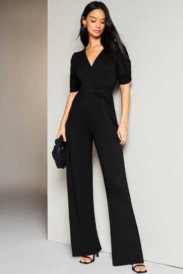 Buy Lipsy Black Petite Short Sleeve Twist Front Jersey Wide Leg Jumpsuit  from Next Luxembourg