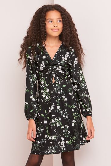 Buy Lipsy Black Floral Knot Front Long Sleeve Dress from Next Netherlands