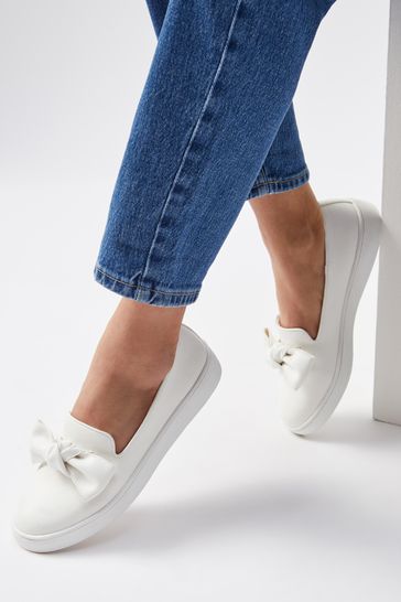 Friends Like These White Faux Leather Wide Fit Slip On Bow Trim Trainer