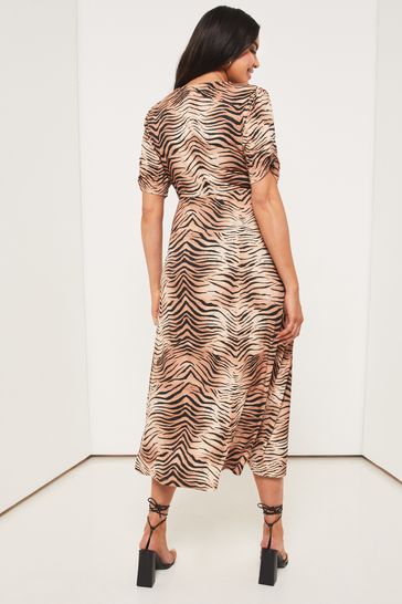 Buy Lipsy Brown Zebra Print Curve Jersey Knot Front Midi Dress