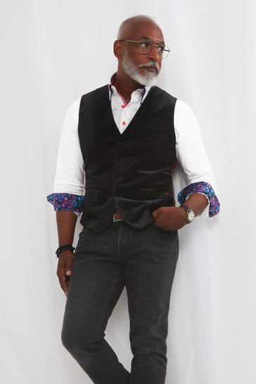 Black waistcoat shop with blue jeans