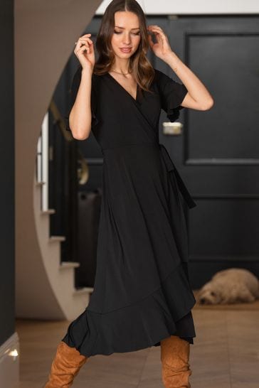 Buy Pour Moi Black Megan Slinky Recycled Stretch Frill Detail Midi Wrap Dress from Next Netherlands