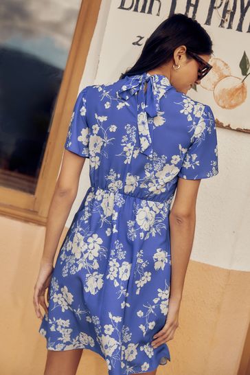 Buy Friends Like These Blue Keyhole High Neck Short Sleeve Tie Back Mini Dress from Next Denmark