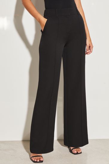 Buy Lipsy Black Petite Wide Leg Woven Smart Trousers from Next