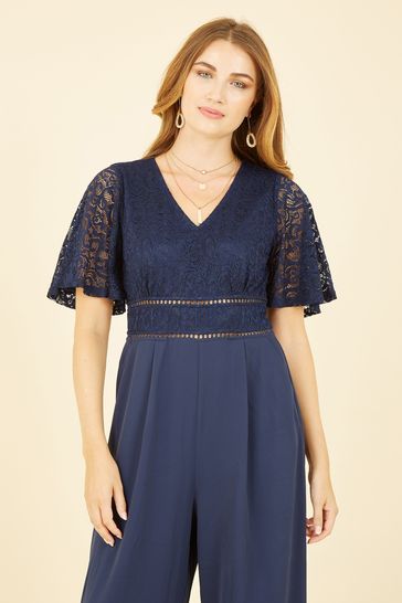 Buy Yumi Navy Blue Lace Bodice Jumpsuit With Kimono Sleeve from