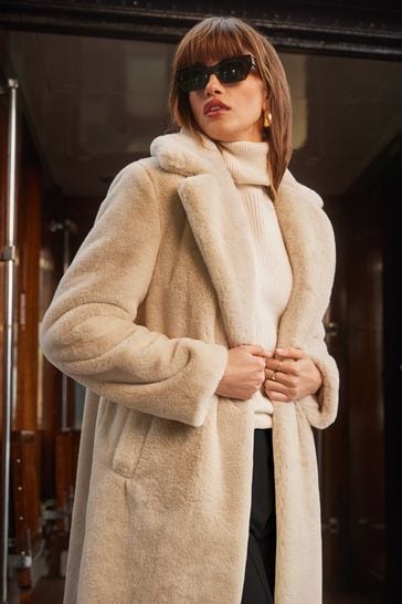 Long cream faux fur coat clearance