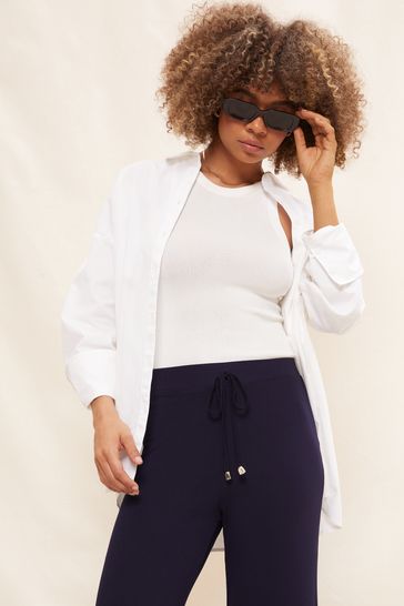 Navy jersey top wide leg trousers