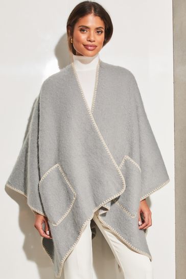 Buy Lipsy Grey Soft Cosy Patch Pocket Tipped Whipstitch Cape from Next Belgium