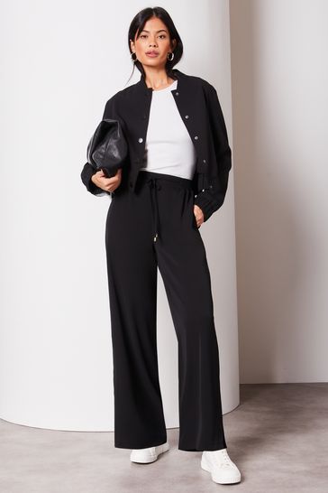 Buy Lipsy Black Wide Leg Split Hem Jogger Trousers from Next USA
