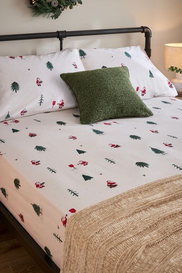 Buy Festive Santa Printed Fitted Sheet and Pillowcase Set from the Laura Ashley online shop